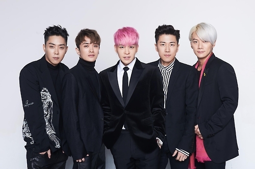This file photo provided by YG Entertainment shows boy band Sechskies (Yonhap)