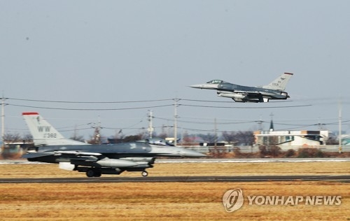 F-16 fighters take off at the U.S. air base in Osan, south of Seoul, on Dec. 6, 2017, to join the annual Korea-U.S. joint air force drill, Vigilant Ace, against North Korean provocations. (Yonhap)
