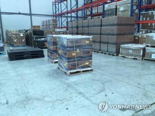 In this undated file photo, boxes of South Korea-made coronavirus testing kits are stored near Incheon International Airport before being shipped to the United Arab Emirates. It was provided by the Ministry of Foreign Affairs.(PHOTO NOT FOR SALE) (Yonhap)