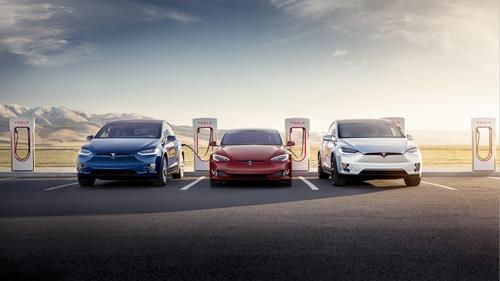 This undated file photo, provided by Tesla, shows the Model X, Model S and Model X being charged by superchargers. (PHOTO NOT FOR SALE) (Yonhap)