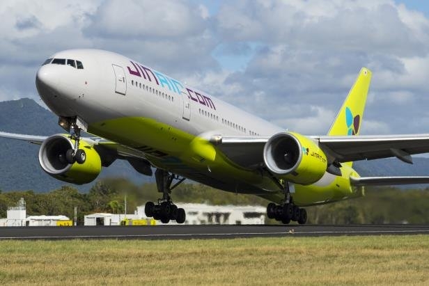 This undated file photo, provided by Jin Air, shows its B777-200ER passenger jet taking off at a local airport. (PHOTO NOT FOR SALE) (Yonhap)