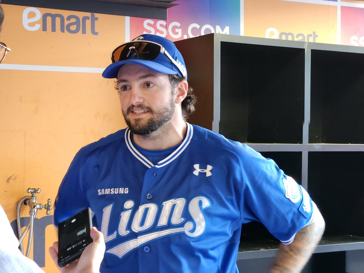 Samsung Lions starter Connor Seabold speaks with Yonhap News Agency at Incheon SSG Landers Field in Incheon, just west of Seoul, on May 14, 2024. (Yonhap)
