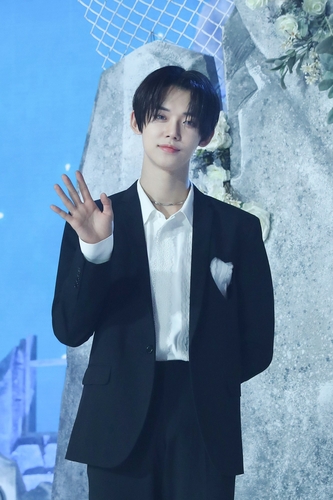 Yeonjun, un membre de Tomorrow X Together (TXT) pose lors d'une conférence de presse en direct, le 31 mai 2021. (Photo fournie par Big Hit Music. Revente et archivage interdits)