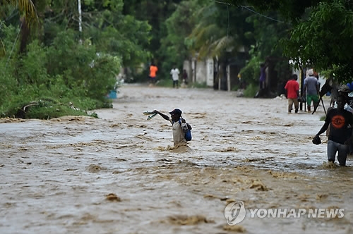 허리케인 '매슈'로 폭우가 내린 아이티 수도 포르토프랭스.［AFP=연합뉴스 자료사진］
