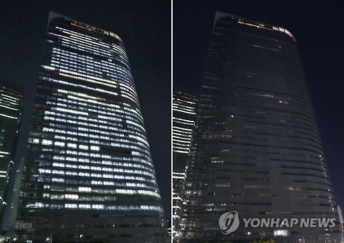 과로사 파문에 지난달 21일 밤 10시에 불끈 일본 덴쓰 본사건물[