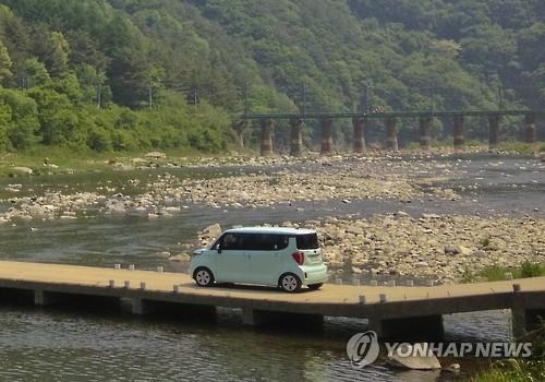 가장 대표적인 경차 레이로 여행을 떠나는 모습(자료사진)