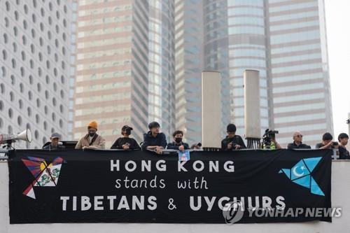 작년 12월 위구르족 지지 표명하는 홍콩 시위대 [EPA=연합뉴스]