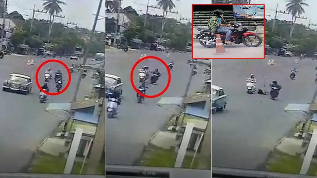 오토바이 날치기 과정에서 피해자가 도로 위로 떨어지는 장면