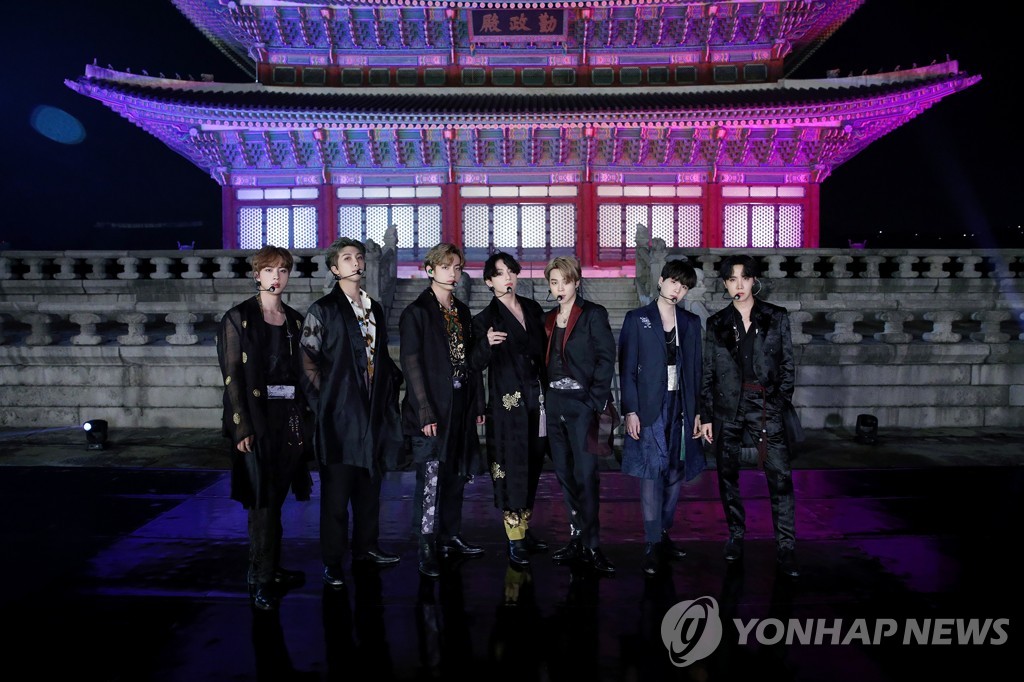 This photo, provided by Big Hit Entertainment on Sept. 29, 2020, shows K-pop group BTS posing for a photo in front of Geunjeongjeon Hall of Gyeongbok Palace in Seoul, South Korea, where the band filmed a performance for the "BTS Week" special on NBC's "The Tonight Show Starring Jimmy Fallon" in the United States. (PHOTO NOT FOR SALE) (Yonhap)