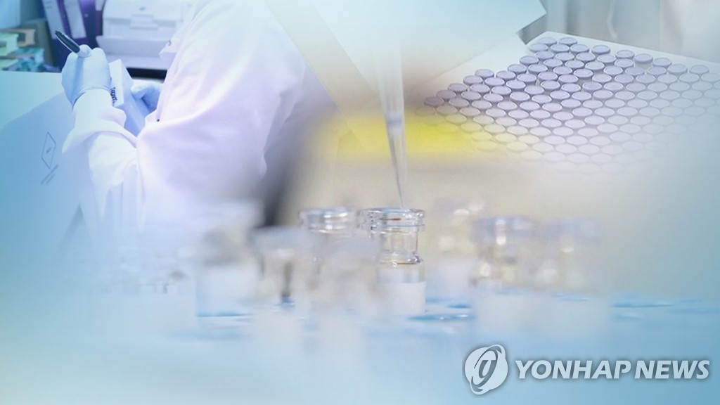This image from Yonhap News TV shows researchers testing COVID-19 vaccines. (PHOTO NOT FOR SALE) (Yonhap)