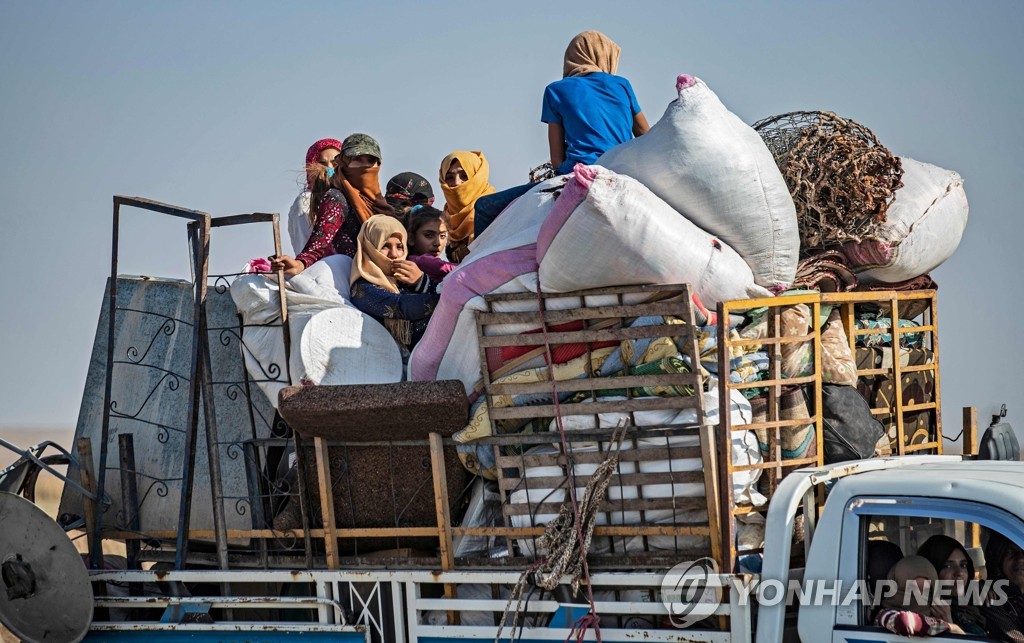 TOPSHOT-SYRIA-KURDS-TURKEY-CONFLICT