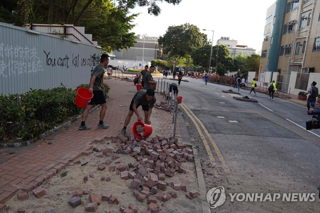 CORRECTION-HONG KONG-CHINA-POLITICS-UNREST