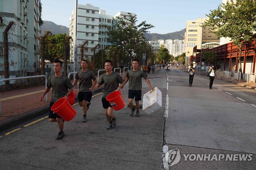 CORRECTION-HONG KONG-CHINA-POLITICS-UNREST