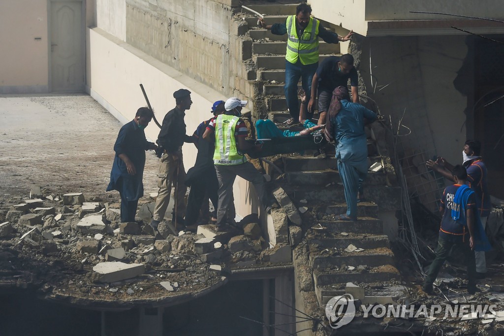 TOPSHOT-PAKISTAN-AVIATION-ACCIDENT