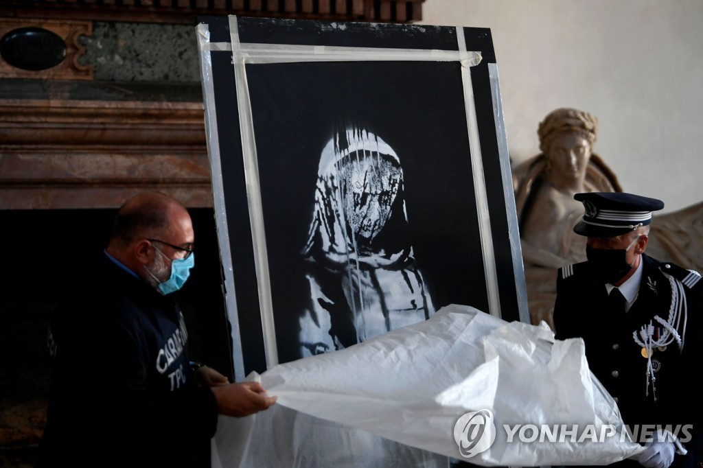 ITALY-FRANCE-STREET-ART-BANKSY
