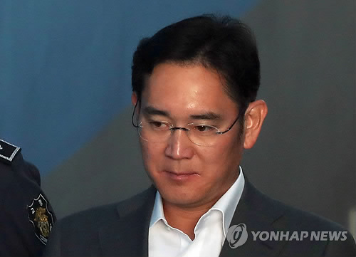 이재용, 비장한 표정