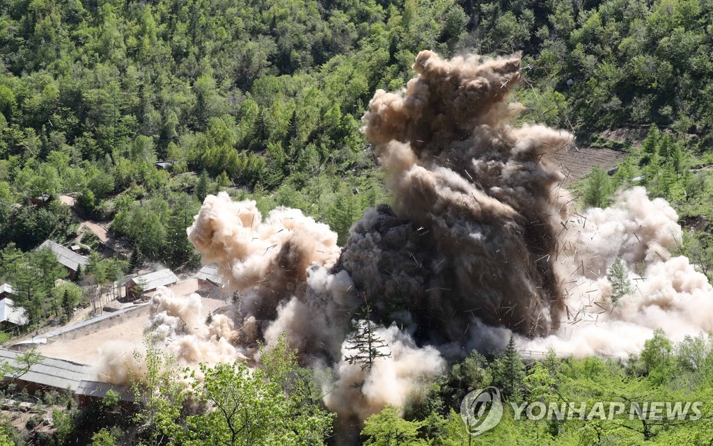 The Tunnel No. 4 at North Korea's only known nuclear test site Punggye-ri is blown up on May 24, 2018, during the dismantlement of the site in this press pool photo. (Yonhap)