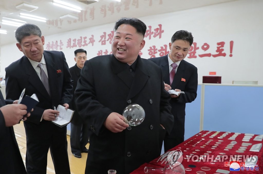 N.K. leader visits glass factory N.K. leader visits glass factory