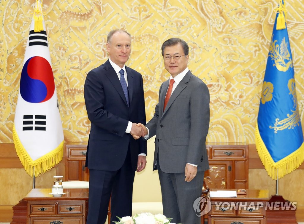 Moon meets Russian security chief Moon meets Russian security chief