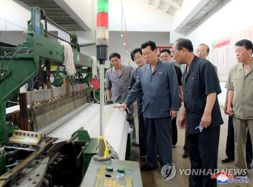 N.K. premier inspects textile mill N.K. premier inspects textile mill