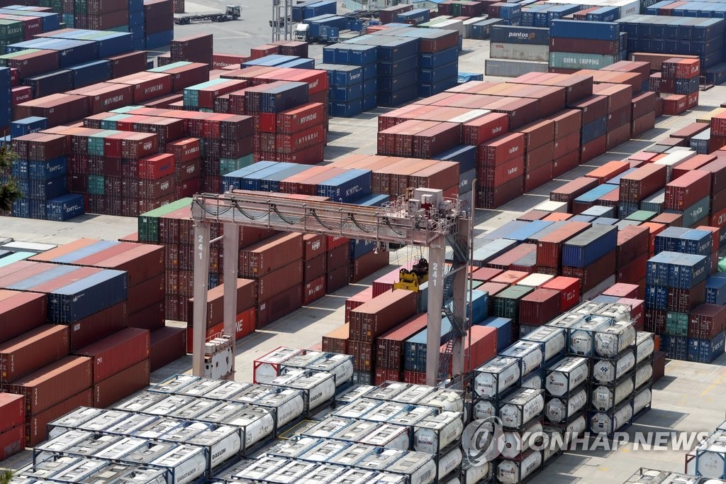 The photo, taken May 1, 2020, shows stacks of import-export cargo containers at South Korea's largest seaport in Busan, 450 kilometers south of Seoul. (Yonhap)