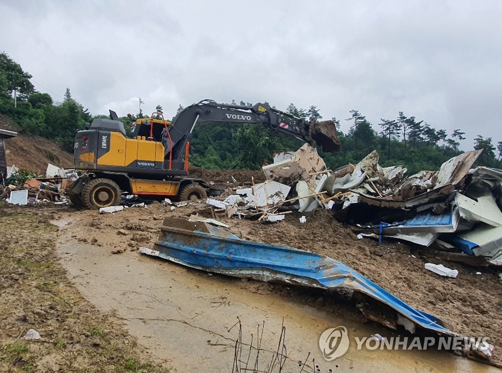 Collapsed home in landslide Collapsed home in landslide