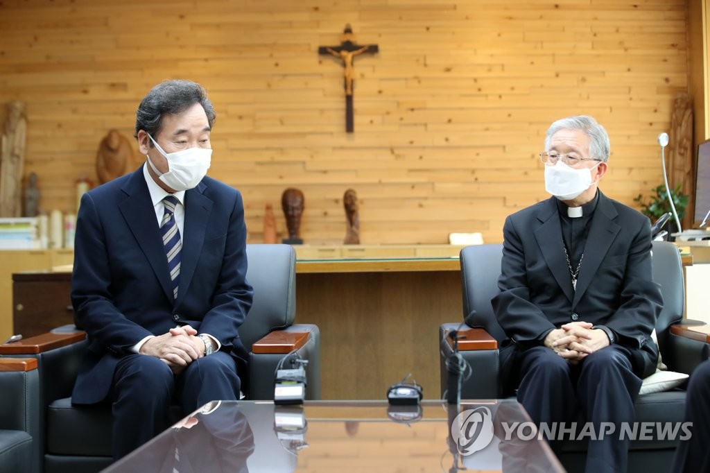 김희중 한국천주교주교회의 의장과 면담하는 이낙연 대표