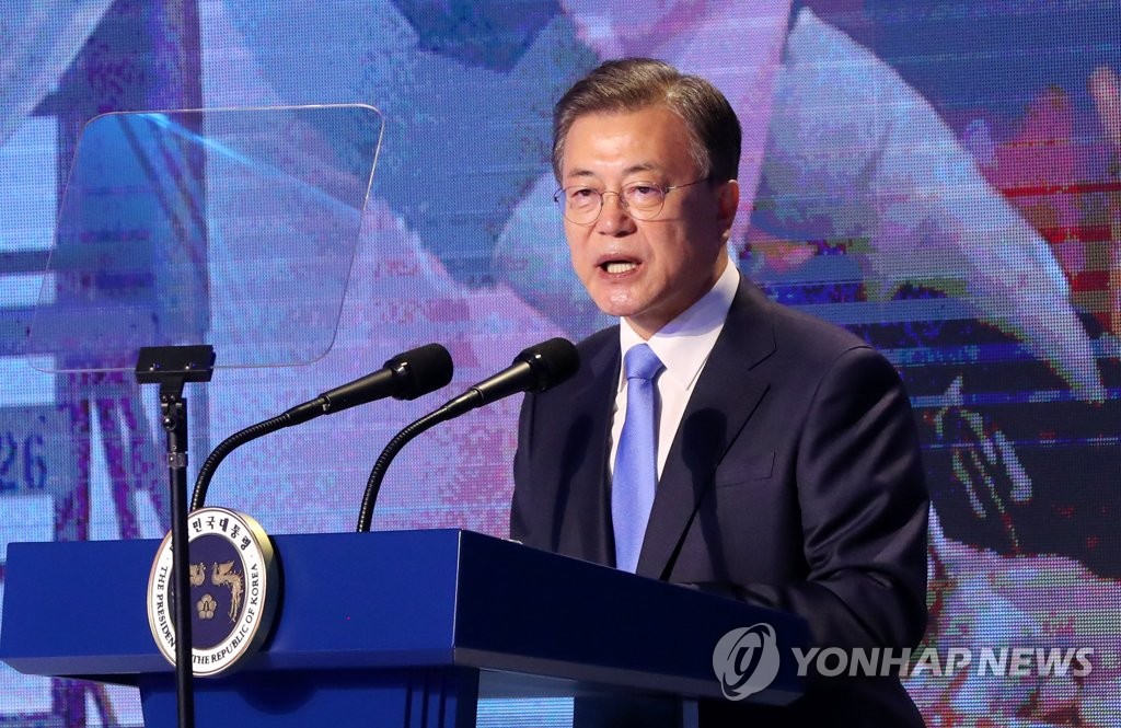 In this file photo, President Moon Jae-in delivers a speech during the 48th Commerce & Industry Day event held at the headquarters of the Korea Chamber of Commerce and Industry (KCCI) in Seoul on March 31, 2021. (Yonhap)