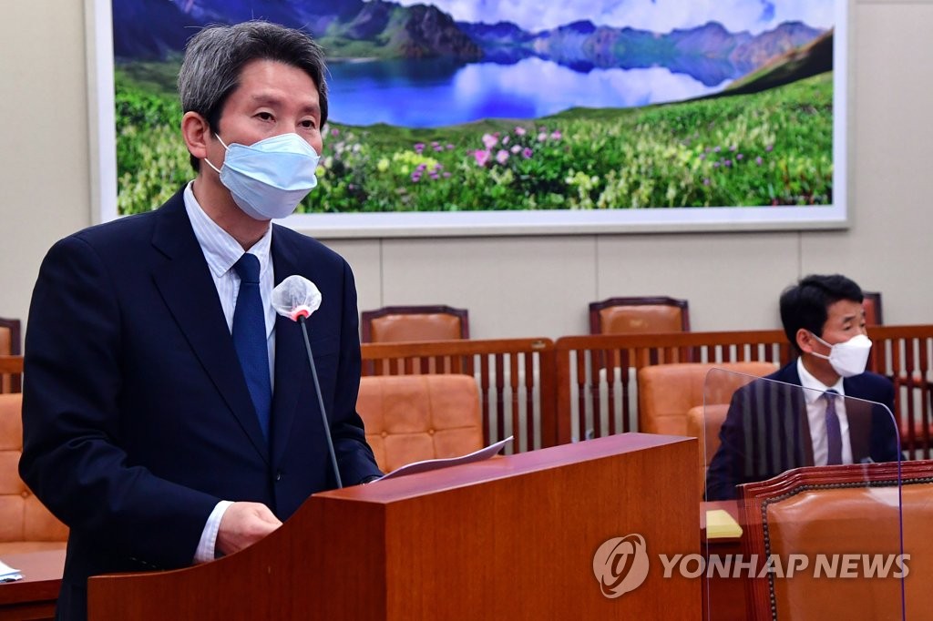 Unification Minister Lee In-young (L), South Korea's point man on inter-Korean relations, speaks during a plenary session of the diplomacy and unification committee at the National Assembly in Seoul on May 28, 2021. (Yonhap)