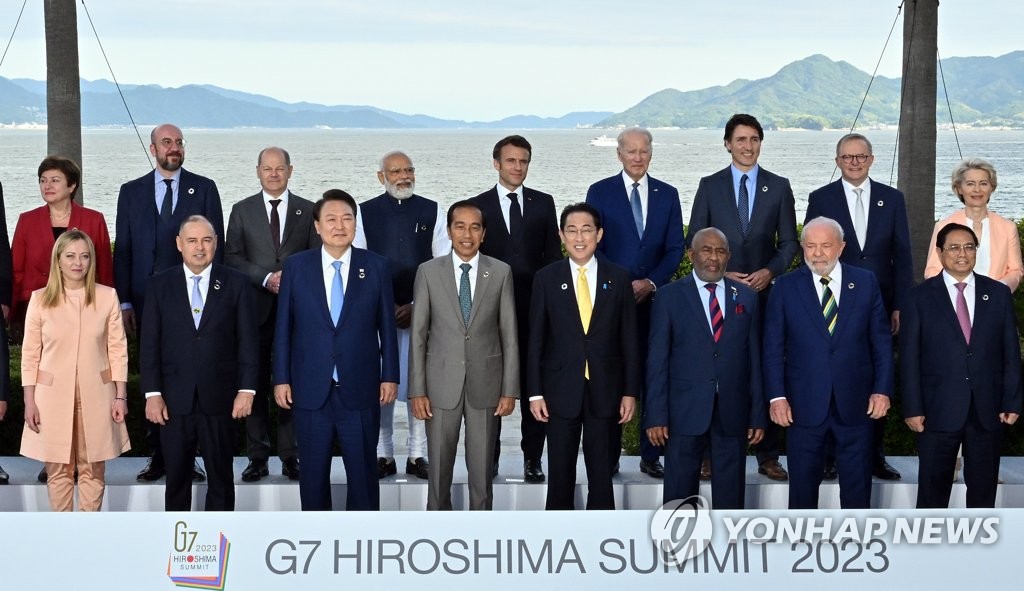 South Korean President Yoon Suk Yeol (3rd from L, front row) poses with other world leaders during a group photo at the Group of Seven summit in Hiroshima, Japan, on May 20, 2023. (Yonhap)