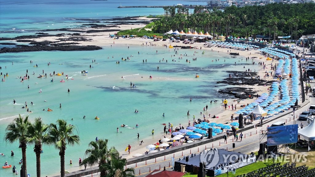 Vacationers At Jeju Beach Yonhap News Agency