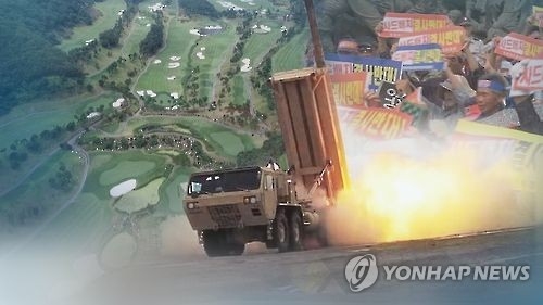 This undated file image shows an interceptor fired from a THAAD launcher against the background of a golf course in Seongju and local residents protesting the THAAD deployment due to health concerns. (Yonhap)