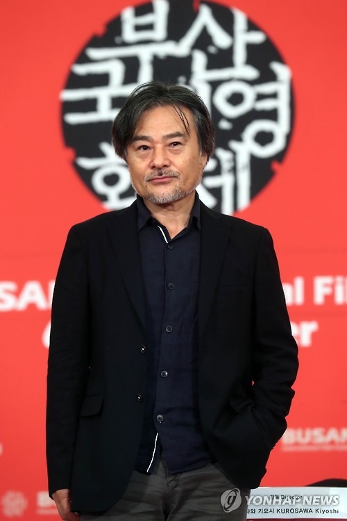 Japanese director Kiyoshi Kurosawa poses for a photo during the 21st Busan International Film Festival on Oct. 8, 2016. (Yonhap)
