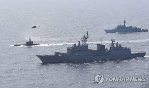 South Korean warships stage an anti-submarine drill in this undated file photo provided by the Navy. (Yonhap)