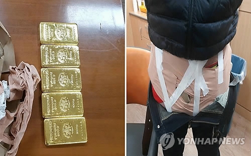 Two arrested for smuggling gold from Hong Kong via Japan - 1