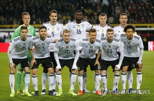 In this Associated Press file photo taken on March 22, 2017, members of the German national football team pose for photos before their friendly match against England at Signal Iduna Park in Dortmund, Germany. Germany will face South Korea, Mexico and Sweden in Group F at the 2018 FIFA World Cup in Russia. (Yonhap)