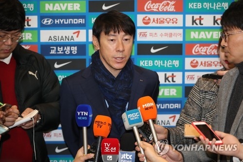 South Korea national football team head coach Shin Tae-yong speaks to reporters after returning home from the 2018 FIFA World Cup draw in Russia at Incheon International Airport, located west of Seoul, on Dec. 3, 2017. (Yonhap)
