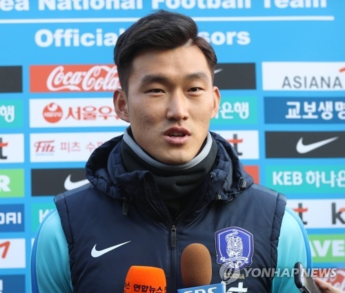 In this file photo taken Dec. 4, 2017, South Korean defender Jang Hyun-soo speaks to reporters before national football team training in Ulsan. (Yonhap)