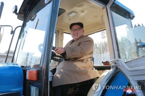 North Korean leader Kim Jong-un test-drives a tractor during his visit to Kumsong Tractor Factory in November 2017 in this image from the North's Korean Central News Agency. (For Use Only in the Republic of Korea. No Redistribution) (Yonhap)
