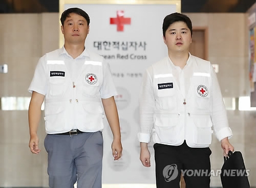 In this photo taken Aug. 4, 2018, officials from the Korean Red Cross leave for the border village of Panmunjom to exchange the final lists of separated families selected to join planned family reunions later this month with their North Korean counterparts. (Yonhap)