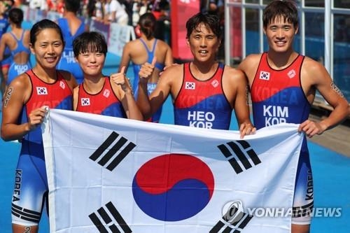 Japan closes Asian Games Triathlon competition with Mixed Relay gold •  World Triathlon