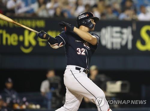 In this file photo from July 20, 2018, Kim Jae-hwan of the Doosan Bears watches his home run against the LG Twins in the top of the seventh inning of a Korea Baseball Organization regular season game at Jamsil Stadium in Seoul. (Yonhap)