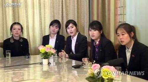 This file photo captured from a North Korean propaganda website, Uriminzokkiri, on April 24, 2016, shows a group of North Korean women identified as coworkers of 13 restaurant workers who defected to South Korea earlier that month. The women insisted that the defectors had been tricked and kidnapped by the South. (Yonhap) 