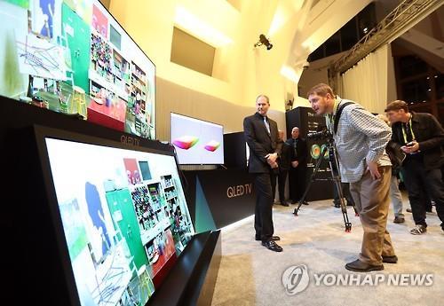 This undated file photo shows QLED and OLED TVs on display during the Consumer Electronics Show (CES) 2020 in Las Vegas, Nevada, from Jan. 7-10, 2020. (Yonhap) 