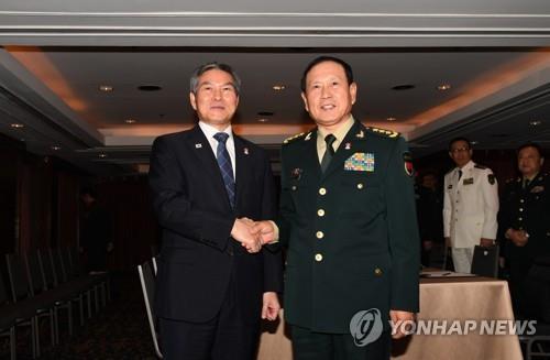 S. Korean, Chinese defense chiefs vow enhanced cooperation in defense ties, virus response