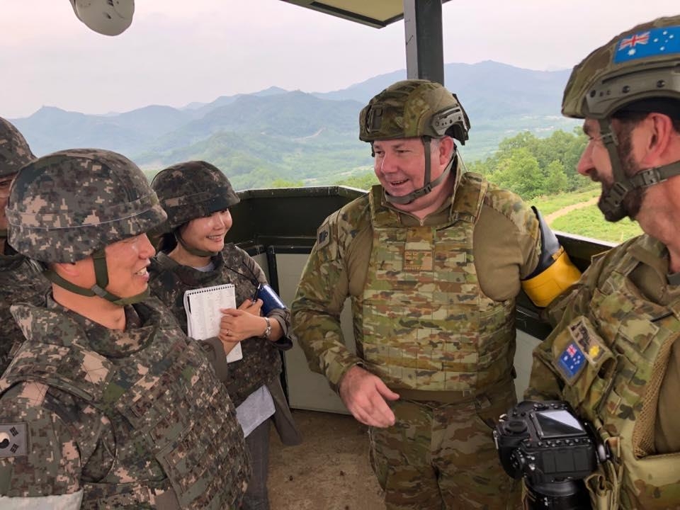 This photo captured from the Facebook account of the United Nations Command on June 12, 2020, shows its deputy commander Vice Adm. Stuart Mayer (C) during a visit to a guard post inside the Demilitarized Zone separating the two Koreas. (PHOTO NOT FOR SALE) (Yonhap)