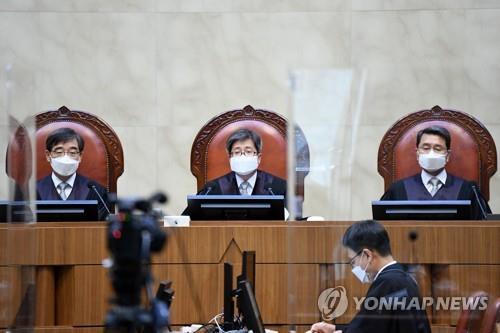 Supreme Court Justices are seated at the court before giving a verdict on Sept. 3, 2020. (Yonhap) 