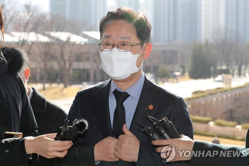 Justice Minister Park Beom-kye answers questions in front of his office at the government complex in Gwacheon, south of Seoul, on March 22, 2021. (Yonhap)
