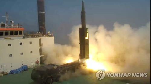 This file photo, provided by the defense ministry and taken on June 23, 2017, shows the Hyunmoo-2, a homegrown ballistic missile with a range of 800 kilometers, being test-fired from a mobile launch pad at a test site of the Agency for Defense Development in Anheung, 200 kilometers southwest of Seoul, with President Moon Jae-in on hand. (PHOTO NOT FOR SALE) (Yonhap)