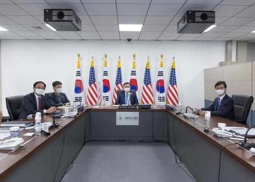 This September 2020 file photo, provided by the defense ministry, shows South Korean officials during the biannual 18th Korea-U.S. Integrated Defense Dialogue (KIDD) held via a videoconference. (PHOTO NOT FOR SALE) (Yonhap)